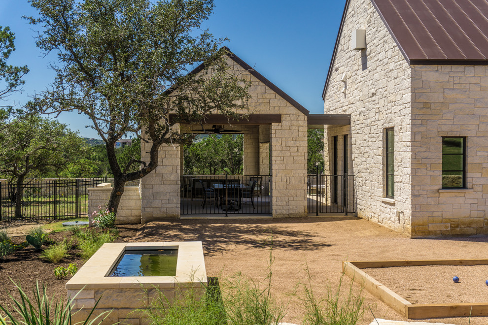 Design ideas for a large farmhouse patio in Austin.