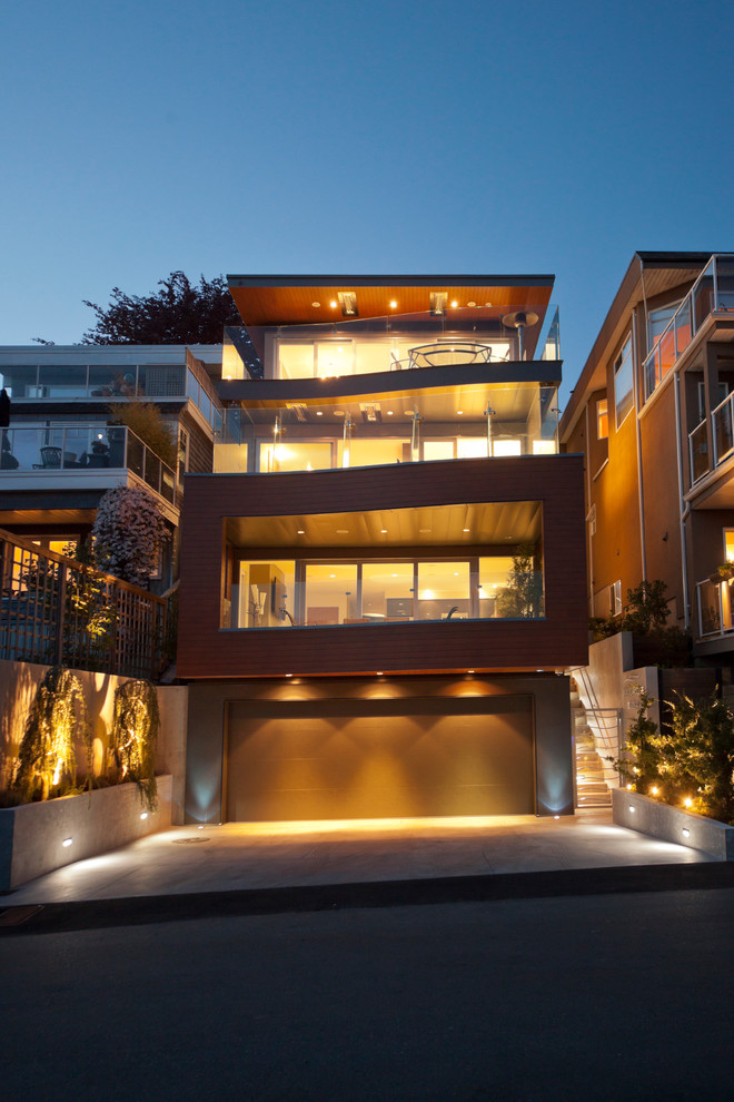 Inspiration for a contemporary three-story exterior home remodel in Vancouver