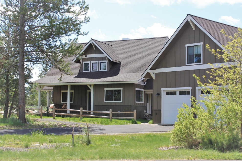 Inspiration for a country gray two-story wood exterior home remodel in Boise with a shingle roof