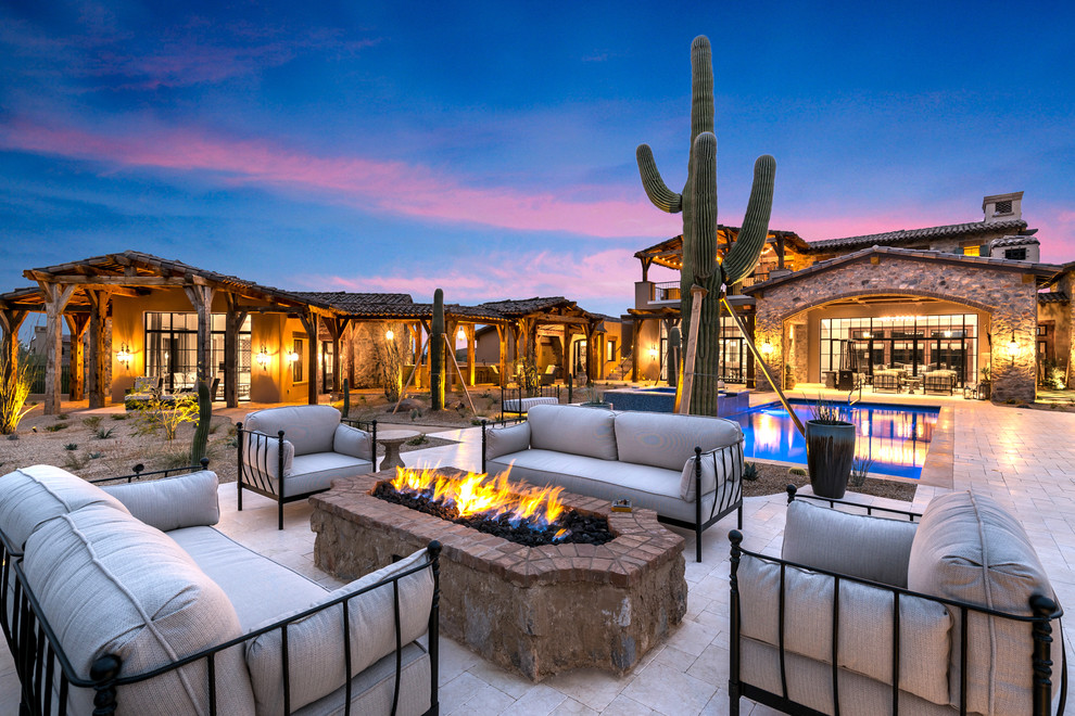Design ideas for an expansive romantic patio in Phoenix.