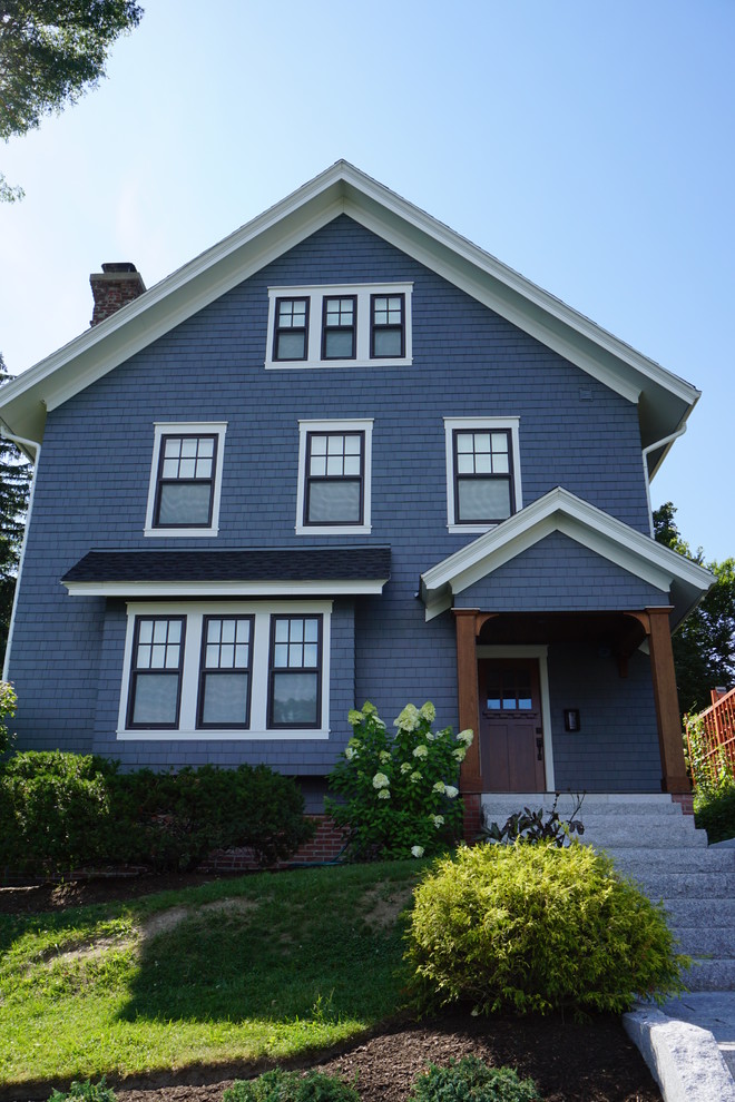 Large country blue three-story concrete fiberboard exterior home photo in Boston with a shingle roof