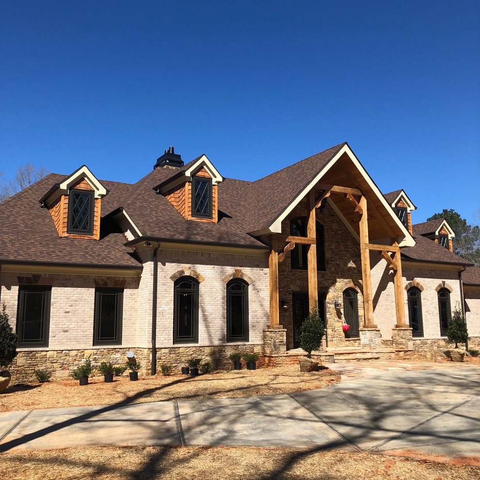 Traditional Custom Home Exterior - brick, natural stone, wood accents ...
