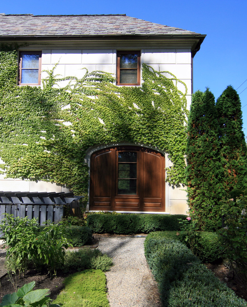 Inspiration for a timeless two-story exterior home remodel in Detroit