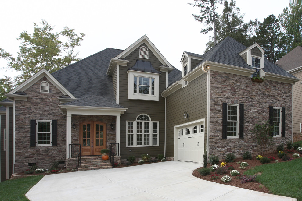 Elegant gray two-story mixed siding exterior home photo in Raleigh