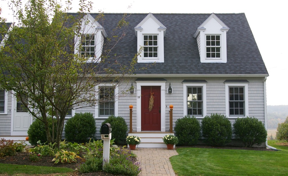 Inspiration for a mid-sized timeless gray one-story wood gable roof remodel in Boston