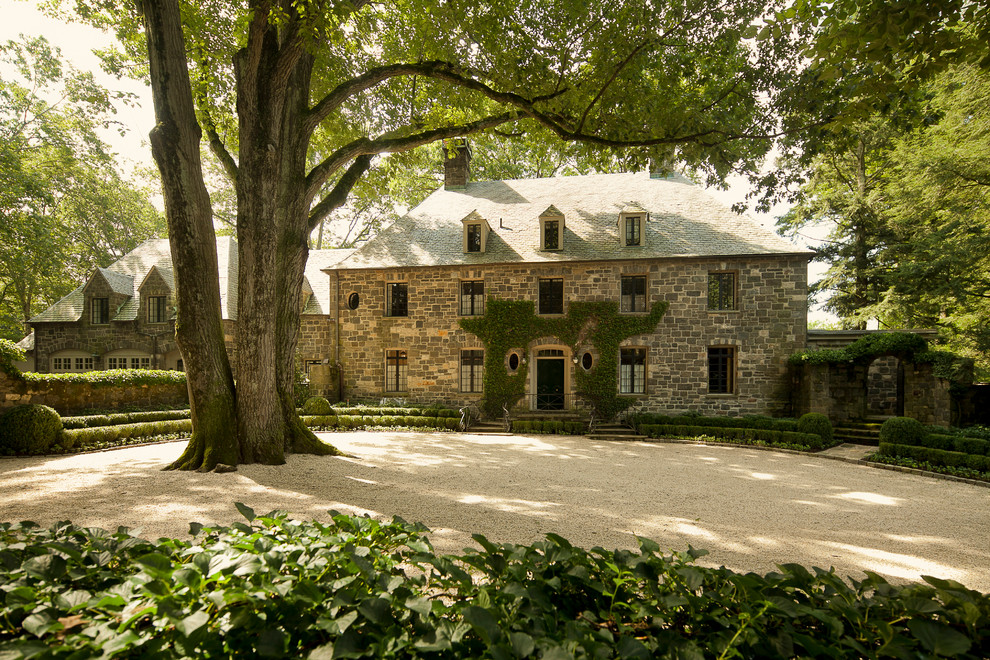 Inspiration for a timeless stone exterior home remodel in New York