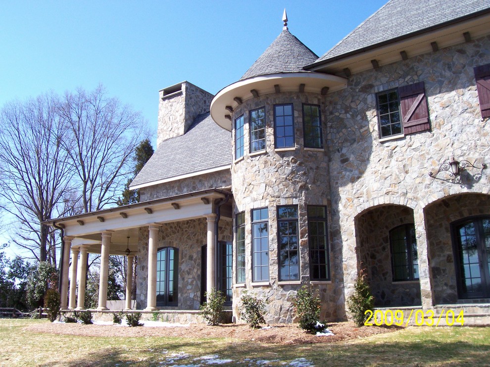Design ideas for a traditional house exterior in Charlotte.