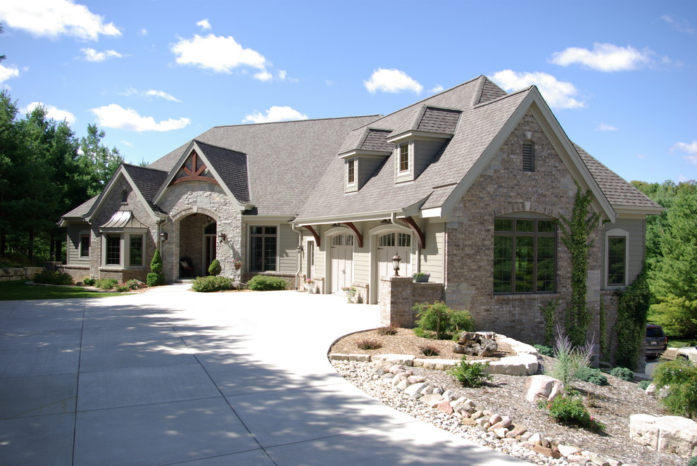Large elegant gray two-story exterior home photo