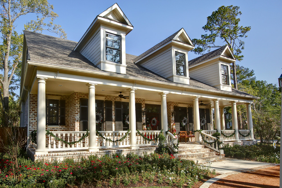 Inspiration for a classic house exterior in Houston with wood cladding.