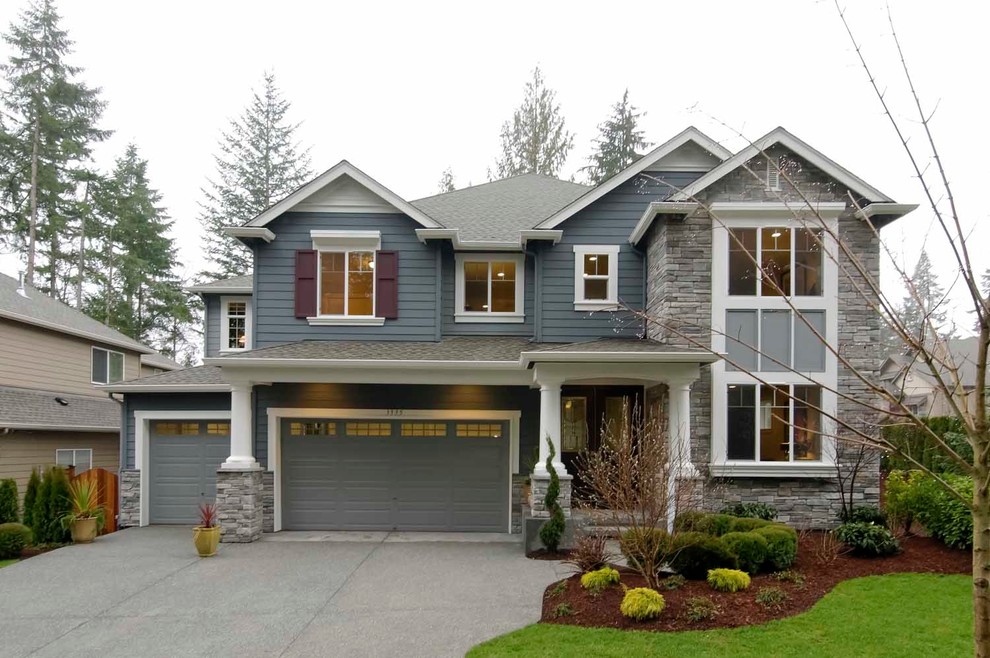 Inspiration for a medium sized and blue traditional two floor house exterior in Seattle.