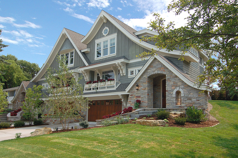 Traditional stone duplex exterior idea in Minneapolis