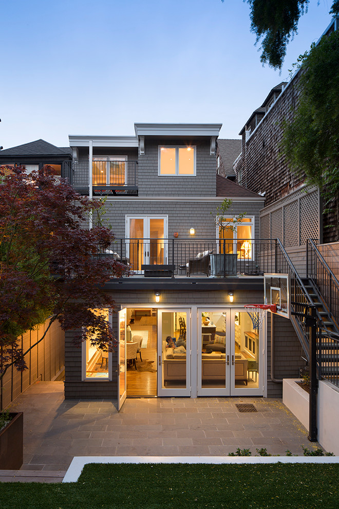 Inspiration for a gey classic house exterior in San Francisco with three floors.