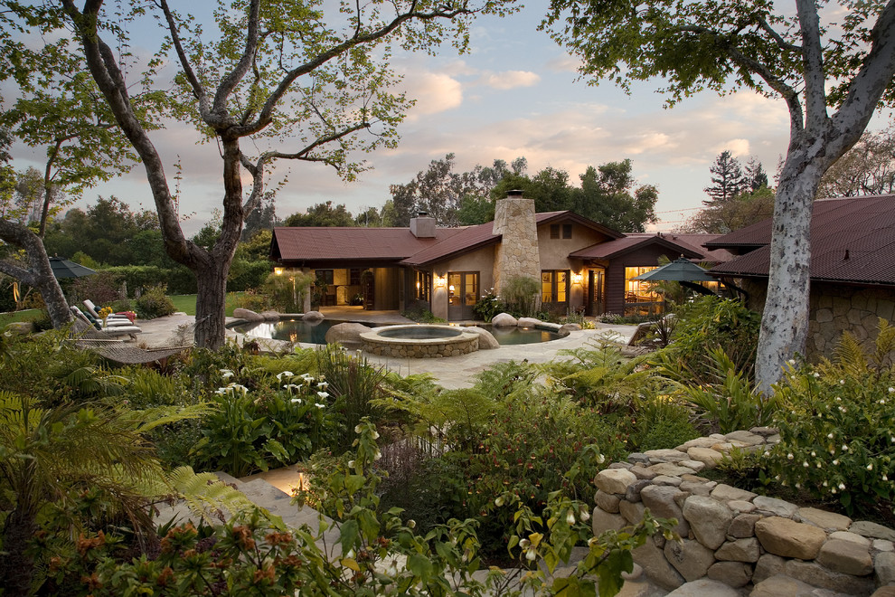 Example of a mid-sized classic one-story exterior home design in Santa Barbara