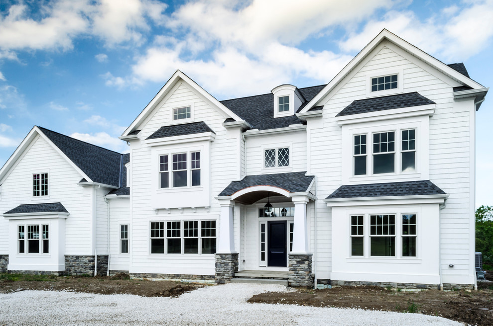 Traditional White Shake Home in Hinckley Ohio Traditional Exterior