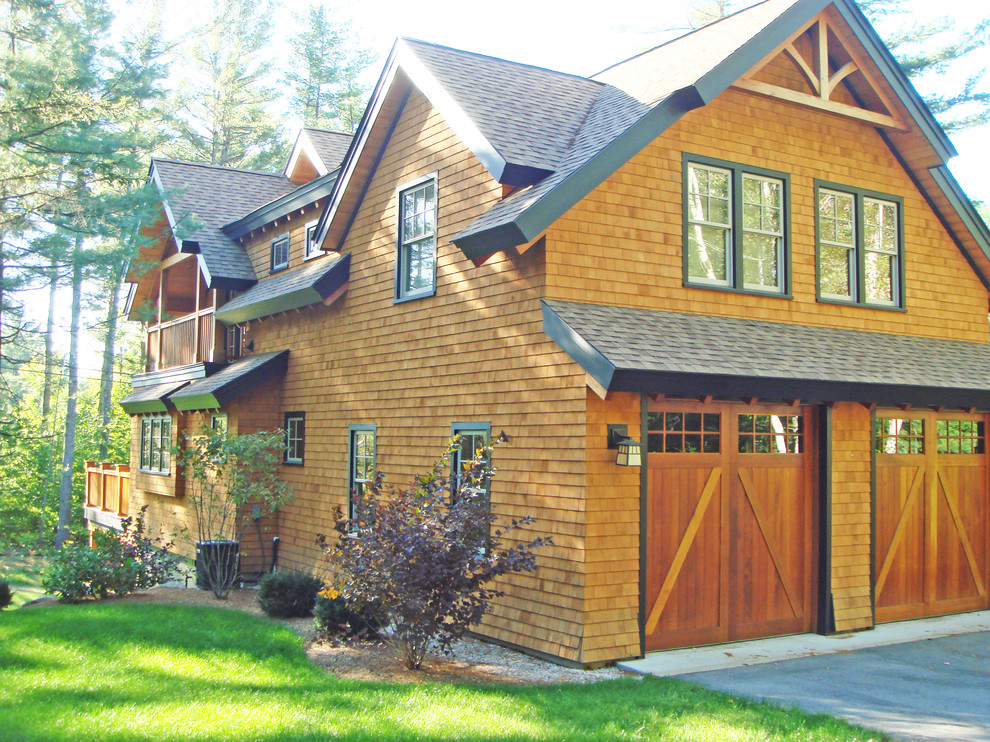 Inspiration for a craftsman two-story wood exterior home remodel in Other with a shingle roof