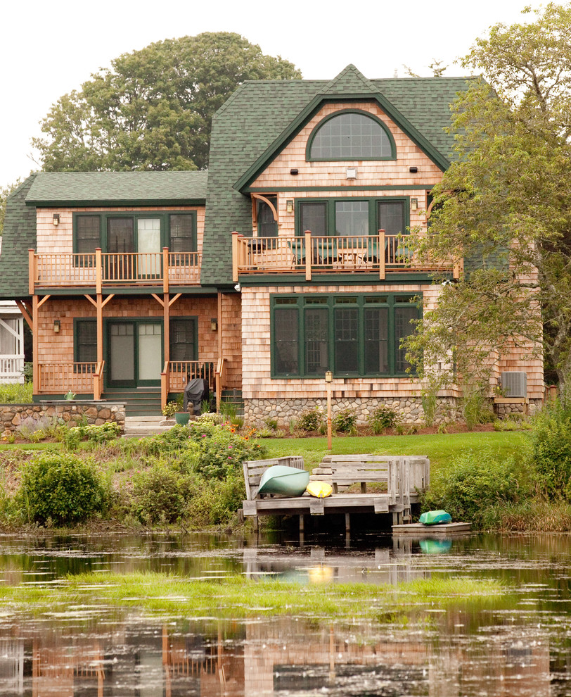 Large rustic brown three-story wood house exterior idea in Providence with a clipped gable roof and a shingle roof