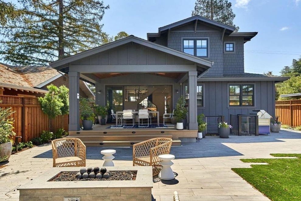 Inspiration for a transitional gray two-story mixed siding exterior home remodel in San Francisco with a shingle roof