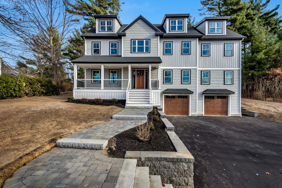 Transitional gray two-story mixed siding exterior home photo in Boston with a shingle roof