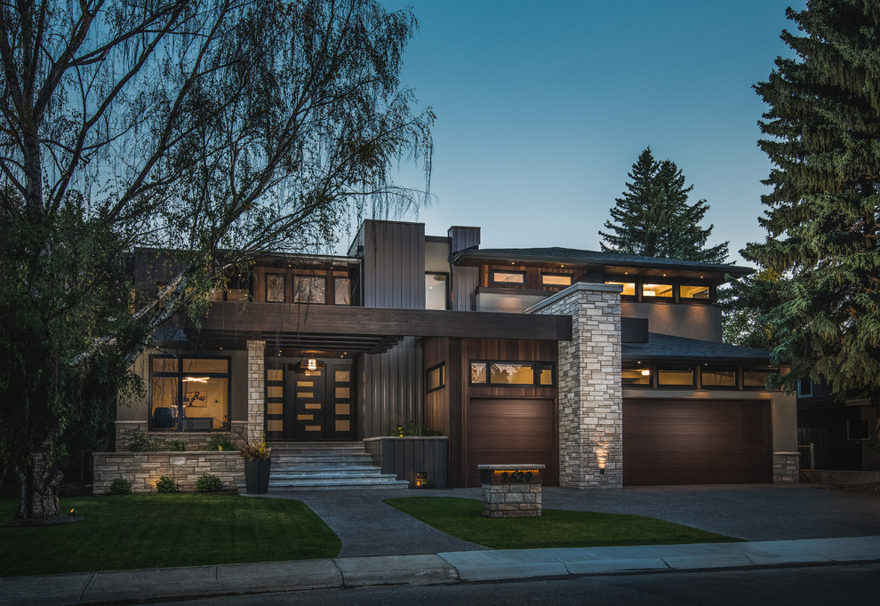 Large transitional house exterior photo in Calgary