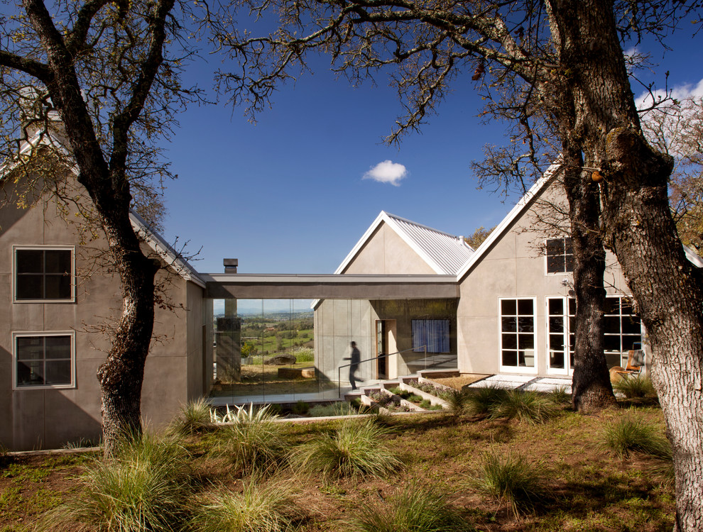 Trendy two-story stucco exterior home photo in San Francisco