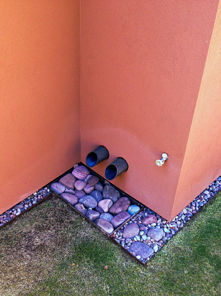 Minimalist red stucco exterior home photo in Phoenix