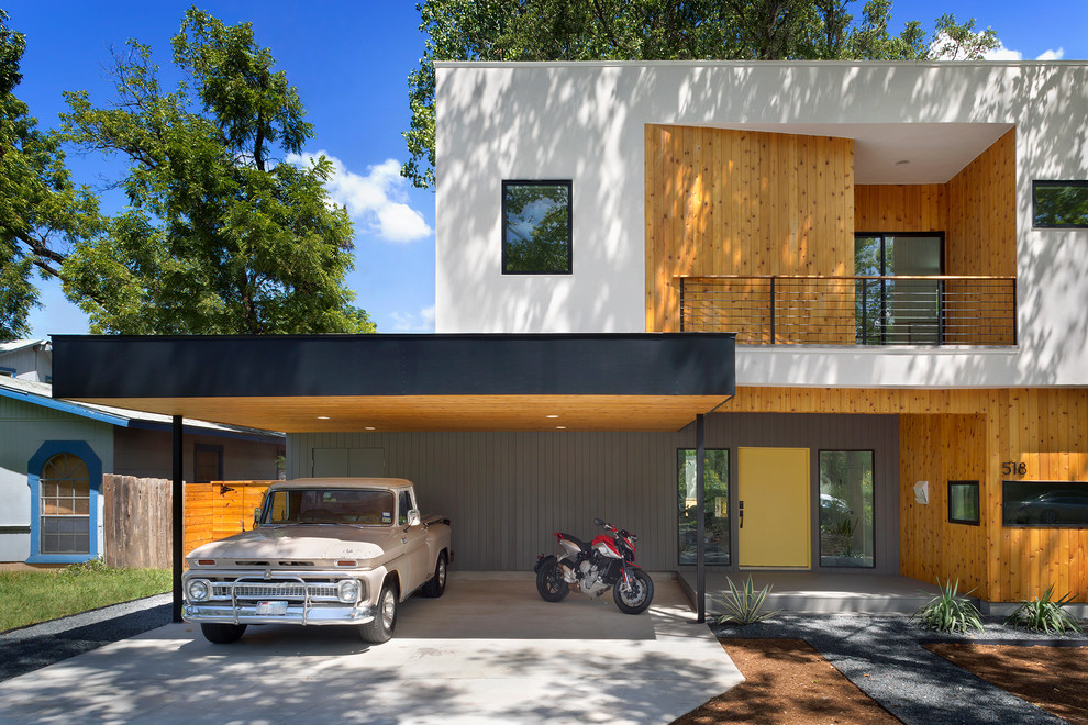 Mittelgroßes, Zweistöckiges Modernes Haus mit Flachdach in Austin