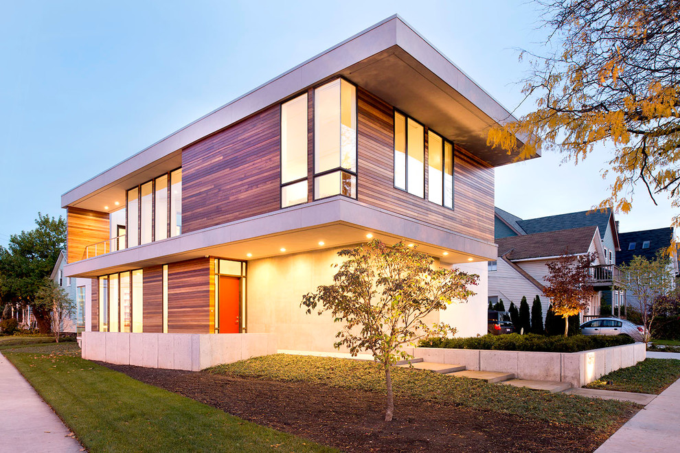 Inspiration for a large contemporary white two-story mixed siding exterior home remodel in Cleveland