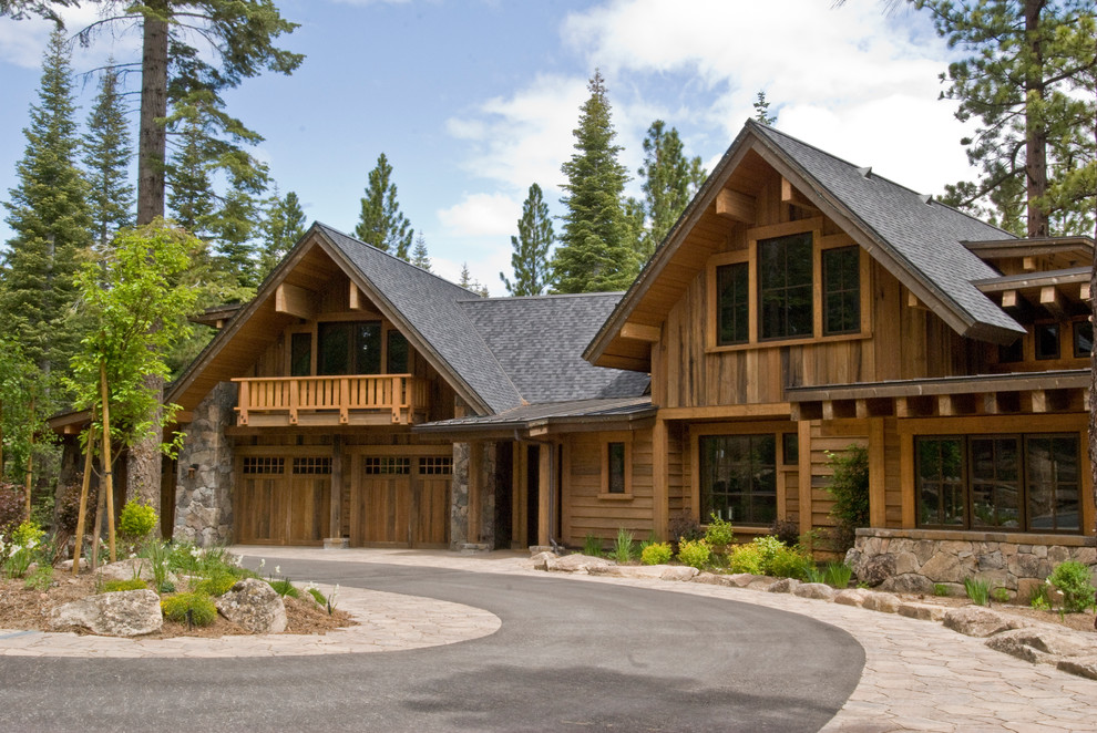 Inspiration for a rustic two floor house exterior in Salt Lake City.