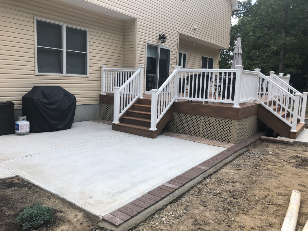 Trex Deck and Concrete Patio Modern Exterior New York by Jan Wil Construction