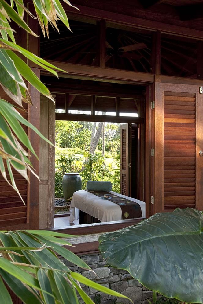 World-inspired house exterior in Hawaii with wood cladding.