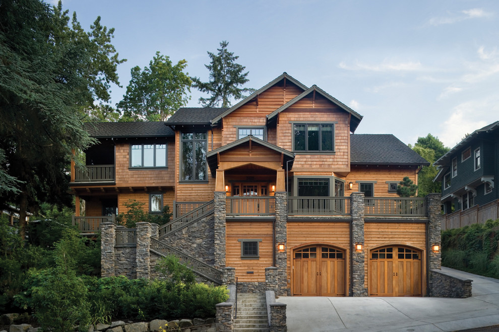 Inspiration for a traditional house exterior in Portland with wood cladding.