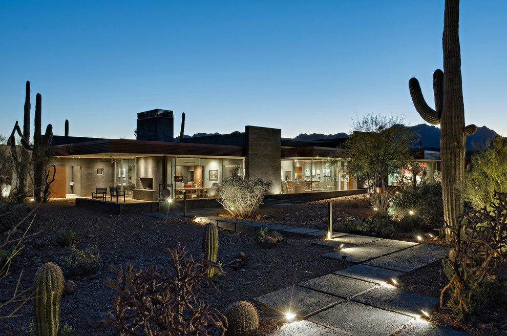 Einstöckiges Modernes Einfamilienhaus mit Betonfassade, grauer Fassadenfarbe und Flachdach in Phoenix