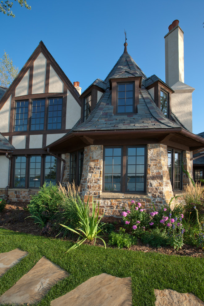 Traditional house exterior in Minneapolis with stone cladding.