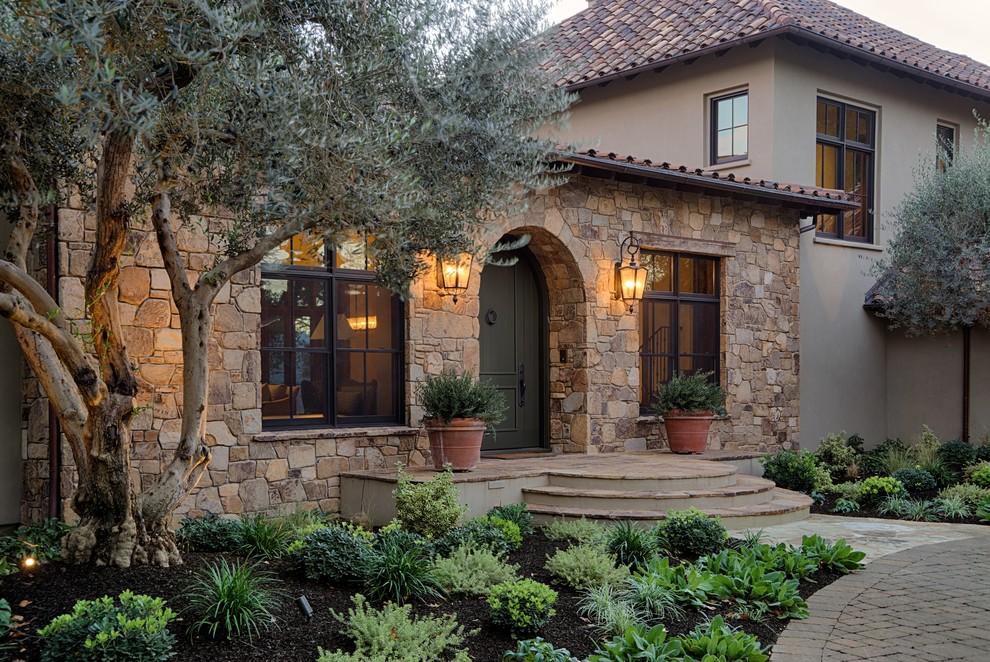 Tuscan brown two-story stone house exterior photo in San Francisco
