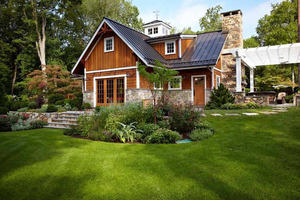 Elegant exterior home photo in New York with a metal roof