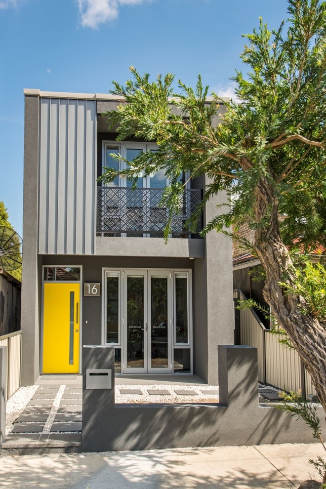 Mid-sized trendy gray two-story exterior home photo in Sydney with a metal roof