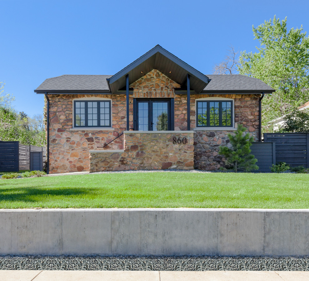 Mid-sized transitional brown split-level stone exterior home photo in Denver with a shingle roof