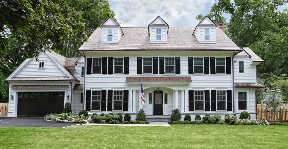 Inspiration for a white classic two floor house exterior in New York.