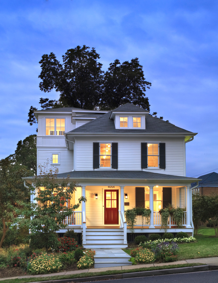 Mid-sized farmhouse white three-story wood exterior home photo in DC Metro with a hip roof
