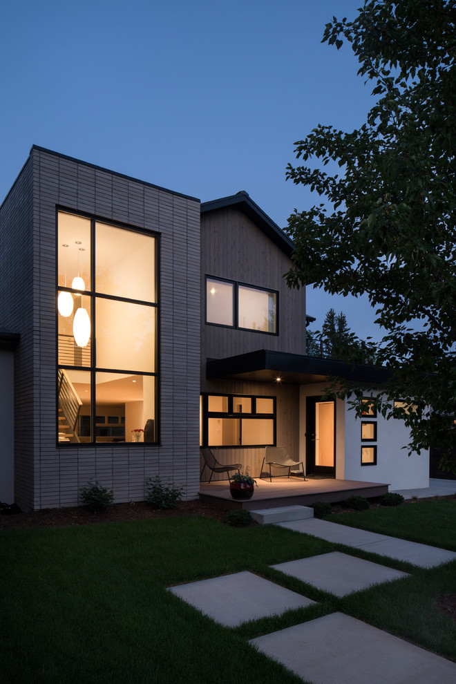 Mid-sized trendy white two-story mixed siding exterior home photo in Denver with a metal roof