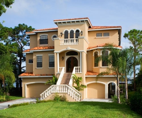 Example of a tuscan exterior home design in Tampa