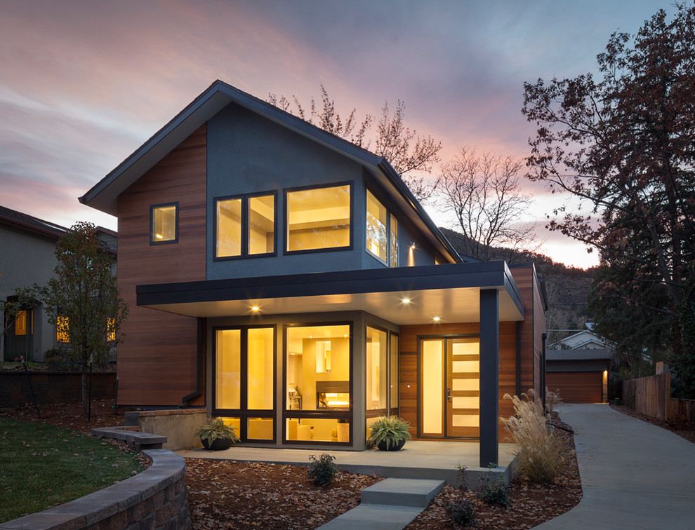 Inspiration for a modern wood exterior home remodel in Denver