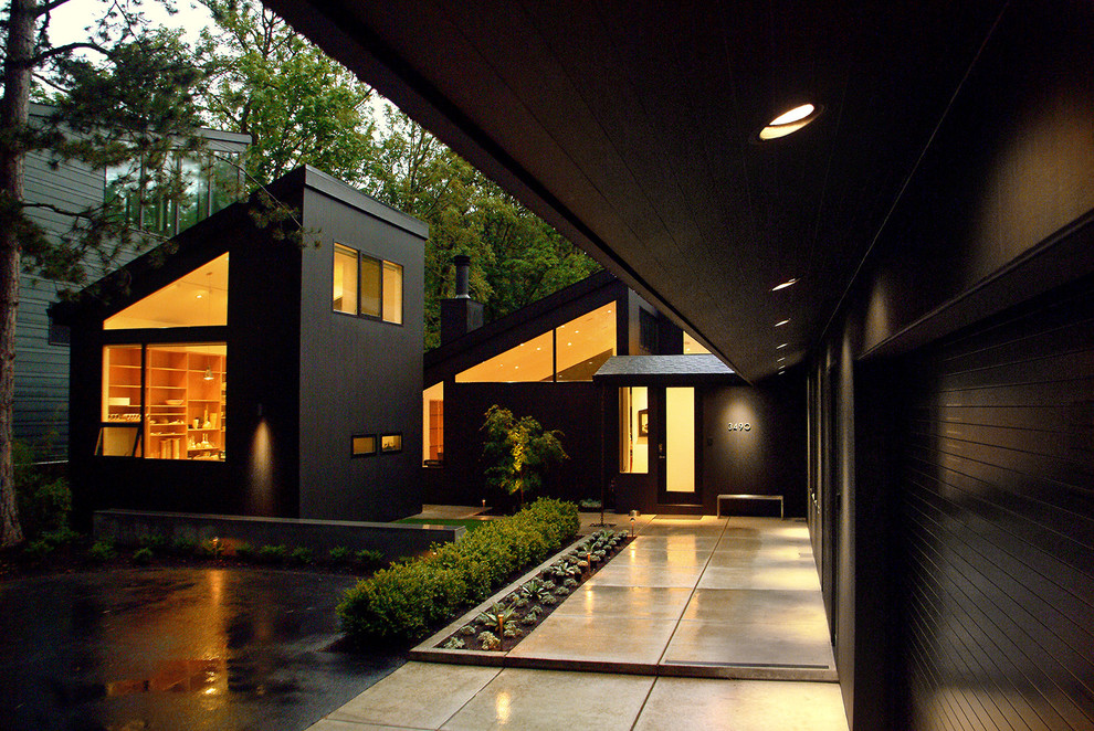 Trendy black exterior home photo in Portland