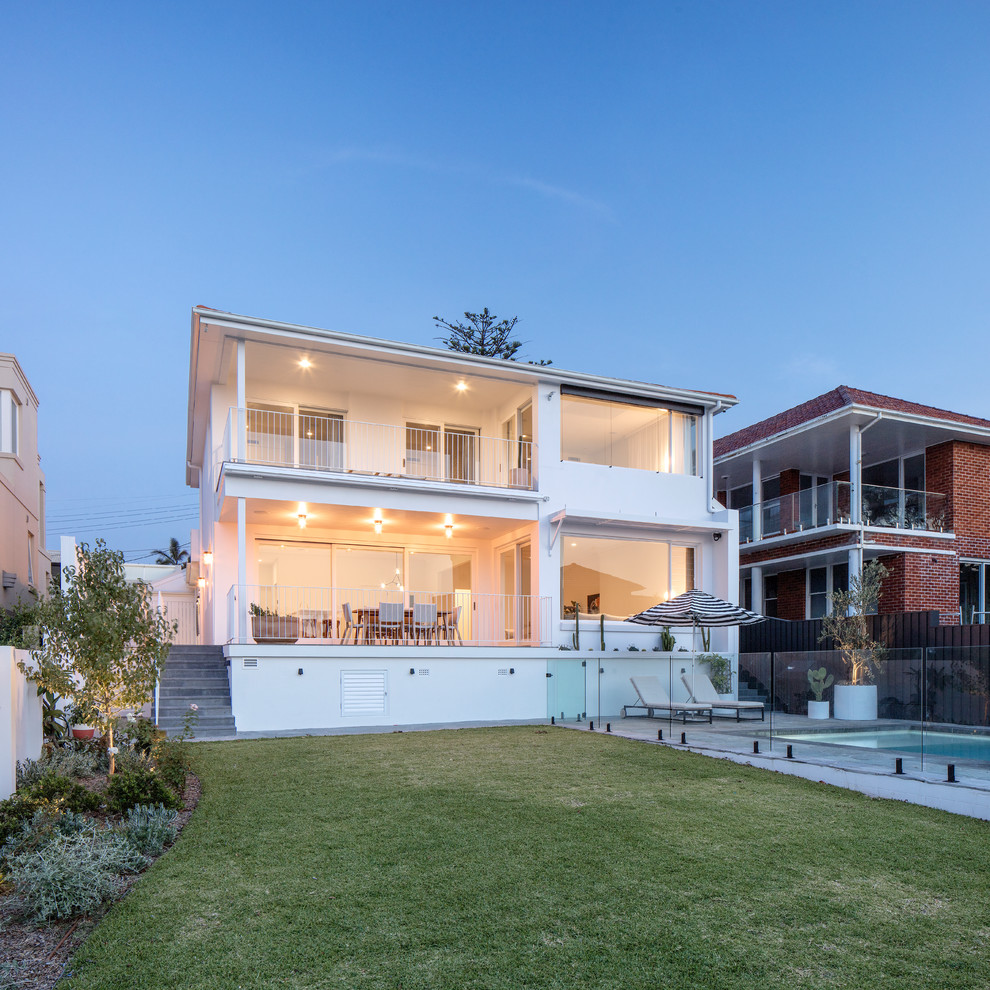 Example of a minimalist exterior home design in Sydney