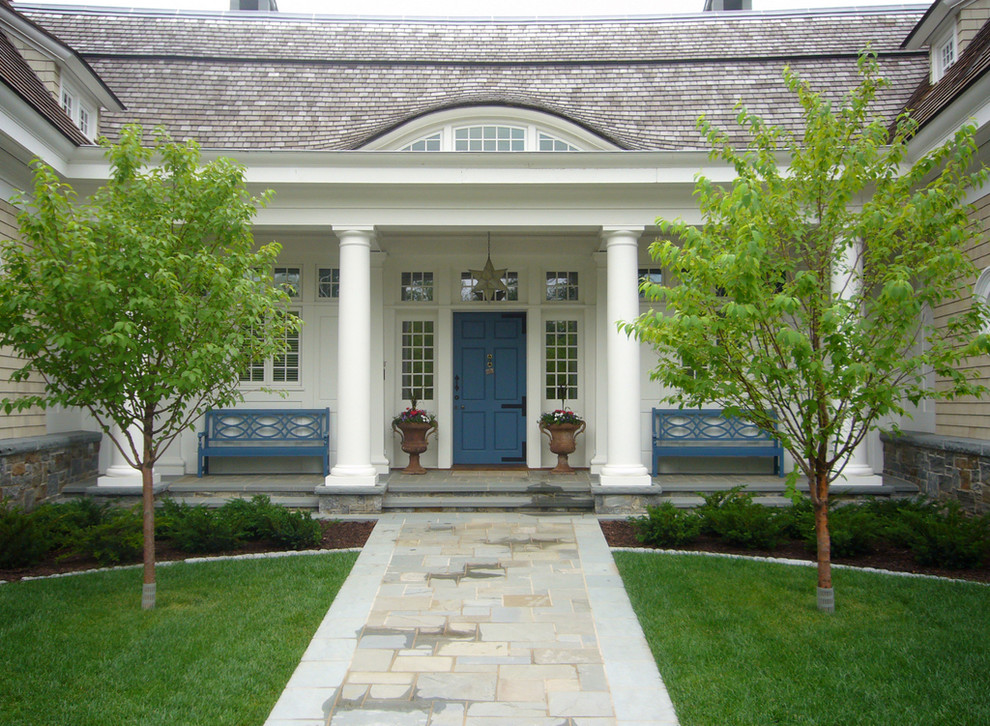 Inspiration for a victorian house exterior in Minneapolis with wood cladding.