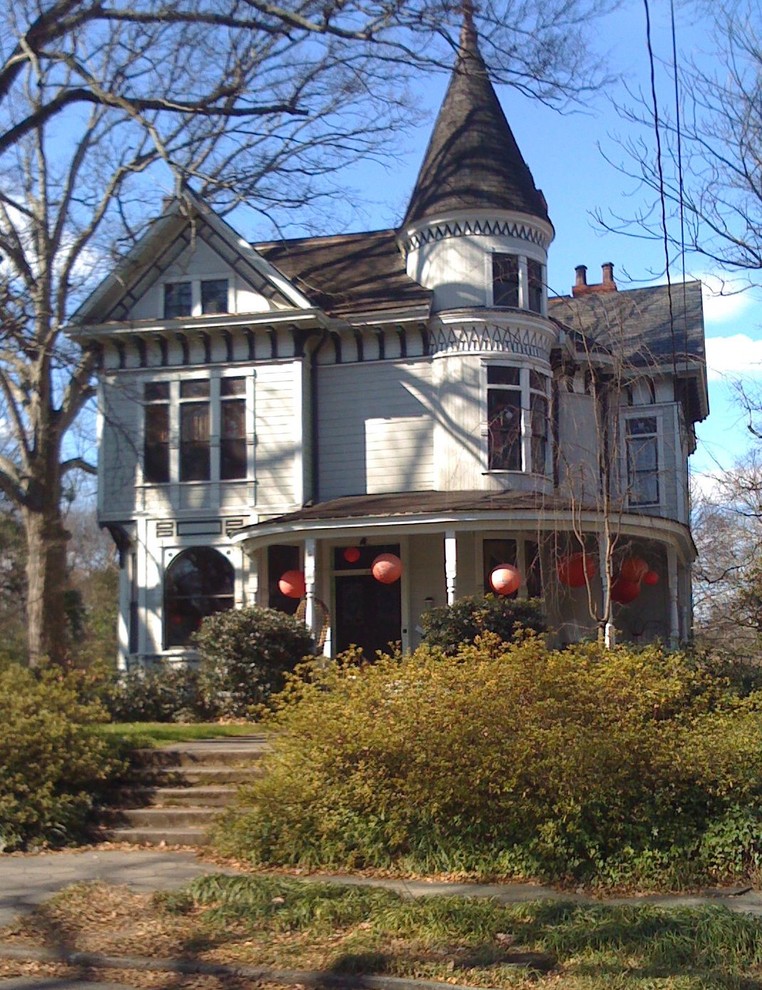 Ornate wood exterior home photo in Atlanta