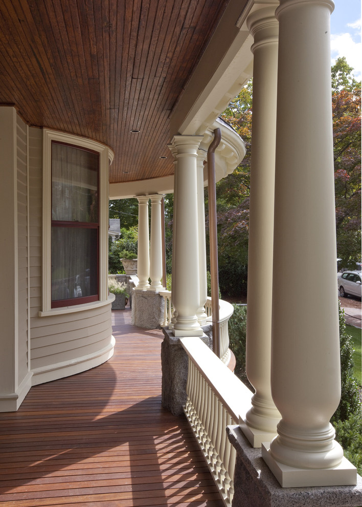 Example of an ornate wood exterior home design in Boston