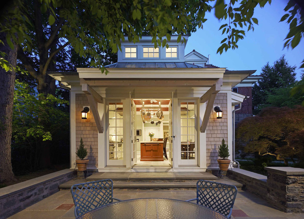 Example of a transitional wood exterior home design in Philadelphia