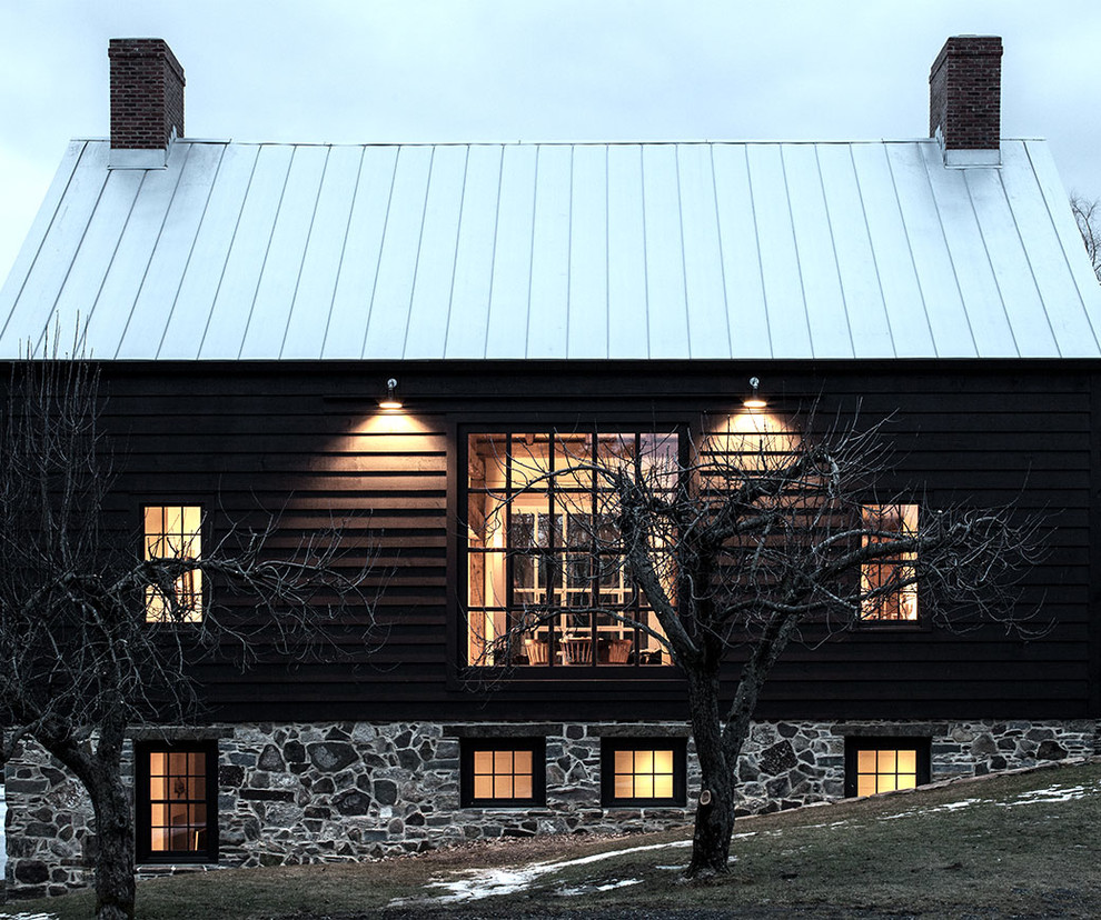 Inspiration for a farmhouse house exterior in Boston.