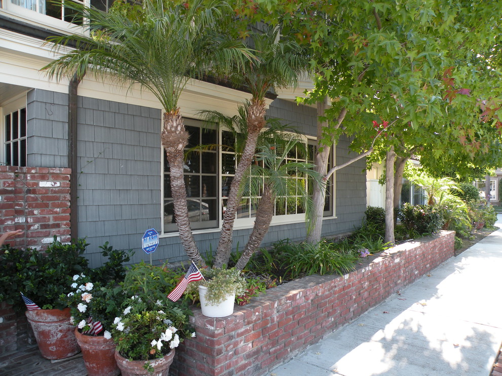 This is an example of a coastal two floor house exterior in Orange County.
